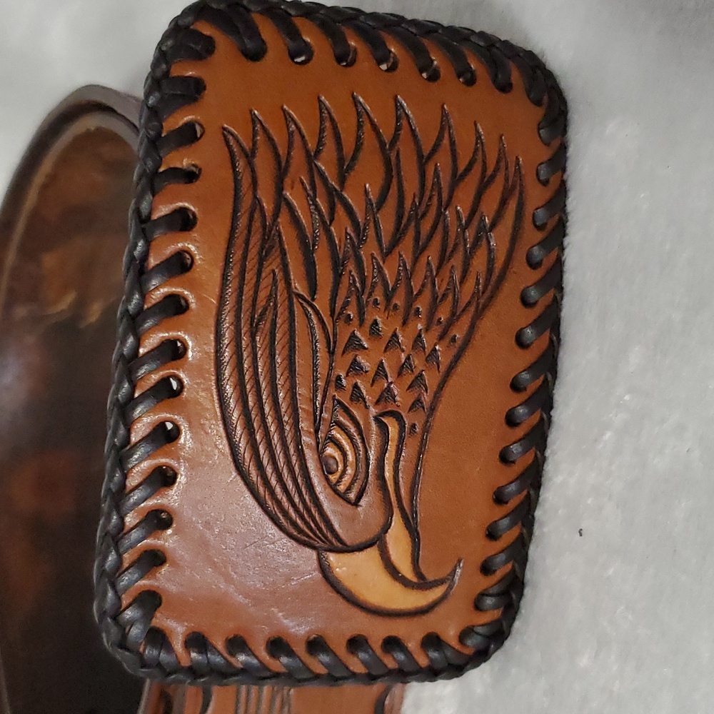 Vintage Leather Belt With Eagle Buckle and Details Embossed Along the Strap.